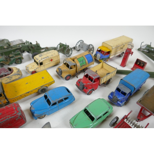 8 - A collection of vintage die cast metal cars, trucks, military vehicles and farming vehicles, mostly ... 