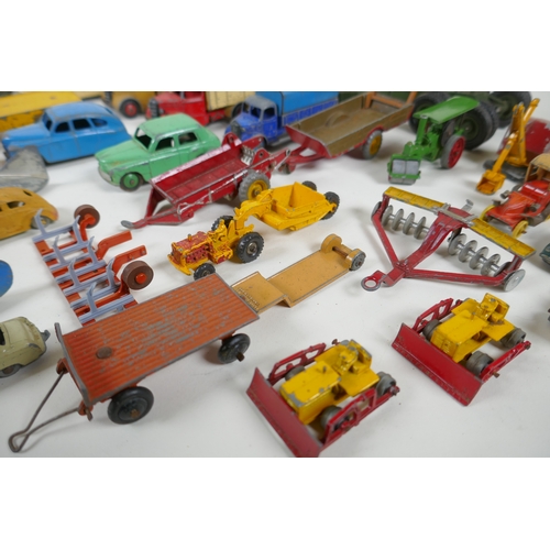 8 - A collection of vintage die cast metal cars, trucks, military vehicles and farming vehicles, mostly ... 