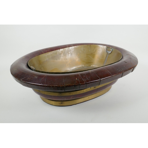 83 - An oriental brass bound wood basin with metal liner, 51 x 40cm