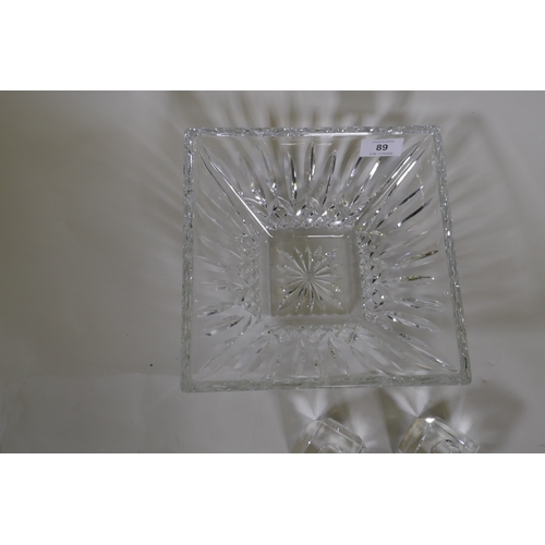 89 - A Waterford crystal cut glass bowl, 23 x 23cm and a pair of Rosenthal glass candle holders