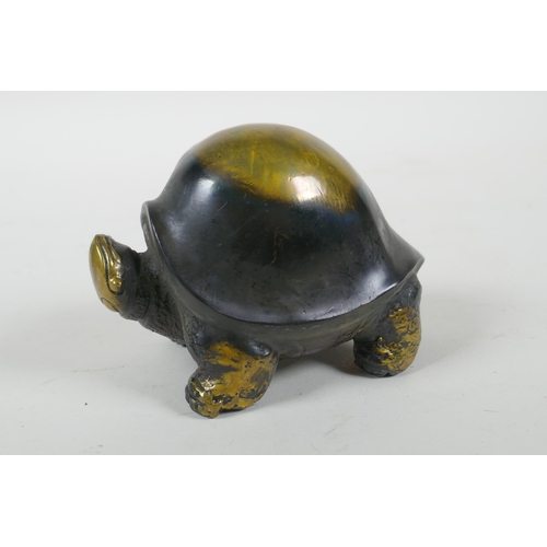 95 - An oriental filled bronze tortoise, 7cm high