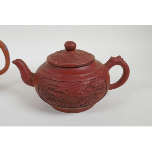 328 - Three Chinese YiXing teapots, one with famille rose enamelled floral decoration, AF, largest 13cm hi... 