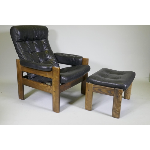 1059 - A mid century Ekornes leather reclining chair with ash frame and matching footstool