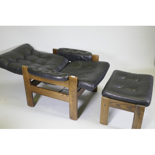 1059 - A mid century Ekornes leather reclining chair with ash frame and matching footstool