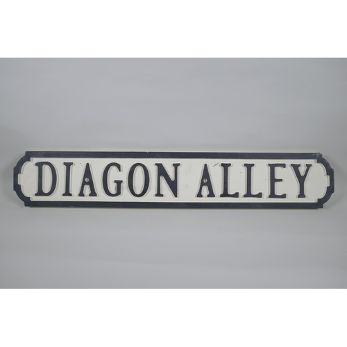 106 - A painted wood Harry Potter 'Diagon Alley' road sign, 14 x 78cm long