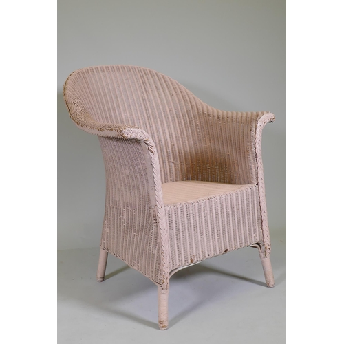 1061 - An antique Lloyd Loom wicker chair