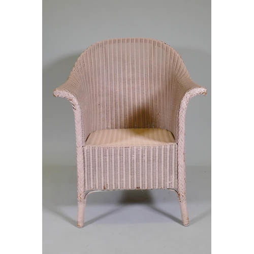 1061 - An antique Lloyd Loom wicker chair