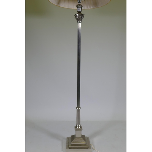 1065 - An electroplated Corinthian column standard lamp, 145cm high