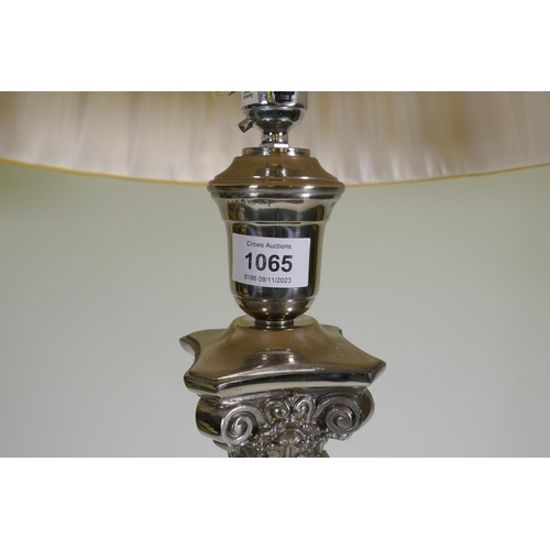 1065 - An electroplated Corinthian column standard lamp, 145cm high