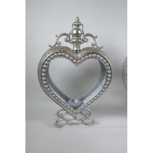 107 - A pair of silvered metal heart shaped lanterns, 52cm high