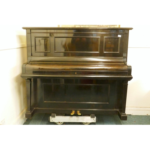 1070 - A 1920s Julius Bluthner upright pianoforte supplied by Waring and Gillow, with iron frame, No.107494... 