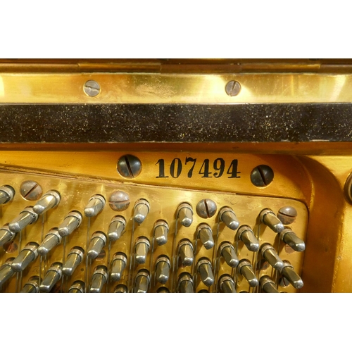 1070 - A 1920s Julius Bluthner upright pianoforte supplied by Waring and Gillow, with iron frame, No.107494... 