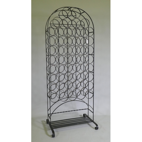 1072 - A wrought metal wine rack, 59 x 22 x 152cm