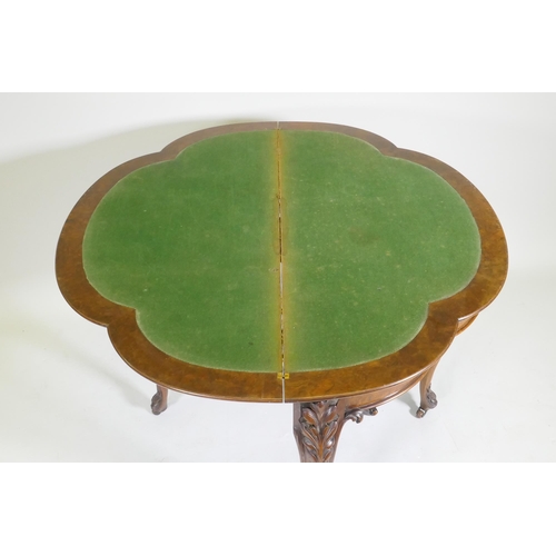 1075 - Victorian inlaid burr walnut shaped top card table, fitted with drawer to back, raised on carved cab... 