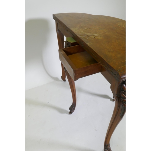 1075 - Victorian inlaid burr walnut shaped top card table, fitted with drawer to back, raised on carved cab... 