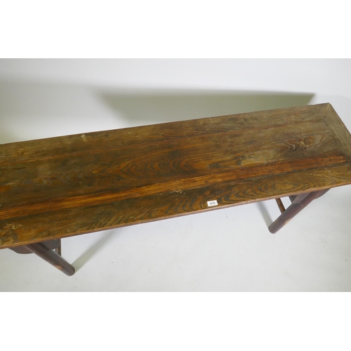 1078 - An oriental elm altar table, 170 x 45cm, 70cm high