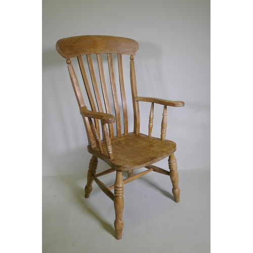 1086 - A Victorian elm and beech Windsor armchair, 112cm high