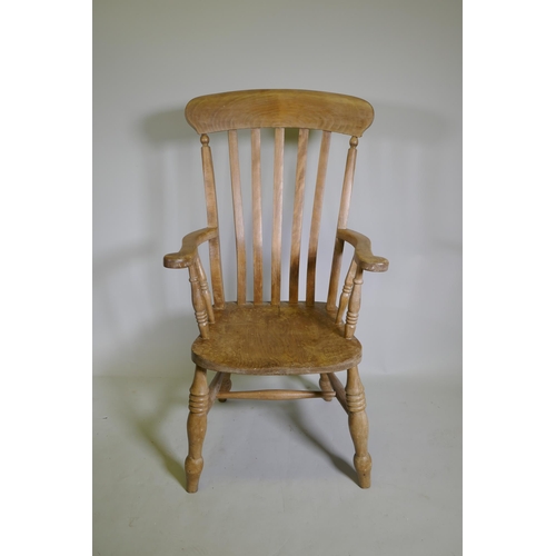 1086 - A Victorian elm and beech Windsor armchair, 112cm high