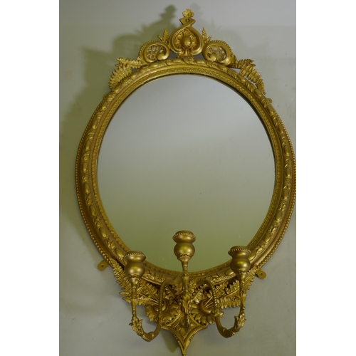 1088 - A pair of Victorian giltwood and composition three branch girondelle wall mirrors, 96cm long