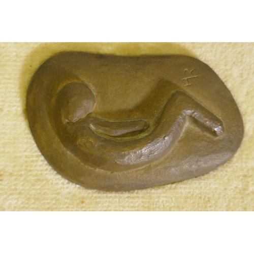 109 - A small bronze depicting a curled figure, signed with a monogram HR, 9cm long