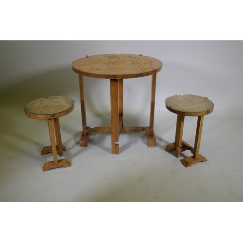 1090 - A set of three Art Deco limed oak occasional tables with carved Chinese dragon decoration, largest 6... 