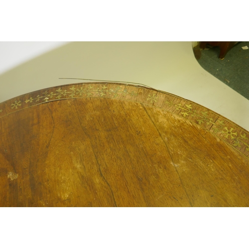 1092 - A Regency brass inlaid rosewood tilt top breakfast table, AF, 122cm diameter