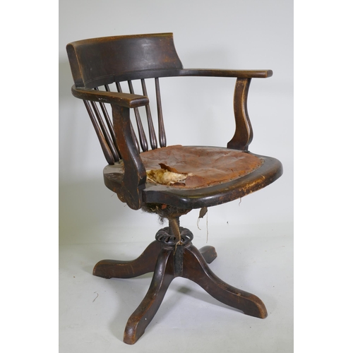 1094 - A late C19th/early C20th beechwood bow back tilt and swivel office chair