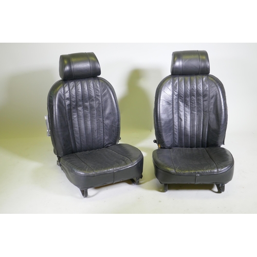 1095 - A pair of reclining car seats with head rests, 75cm high