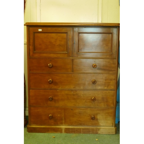 1098 - A Victorian mahogany press cupboard with two doors over two over three drawers, fitted with Hobb's l... 