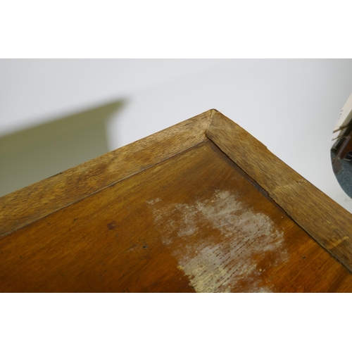 1099 - A Victorian mahogany four drawer kneehole desk, raised on carved cabriole supports, 110 x 52 x 76cm