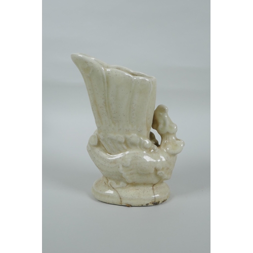 110 - A Chinese white glazed porcelain vase in the form of a phoenix, 18cm high, cracks to glaze