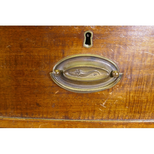 1103 - A George II mahogany bow front chest of two over three drawers, with brass plate handles, raised on ... 