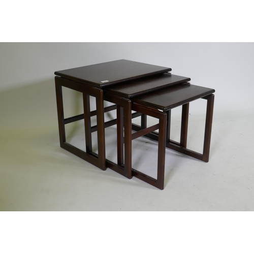 1106 - A nest of three mid century rosewood occasional tables, 55 x 44 x 48cm