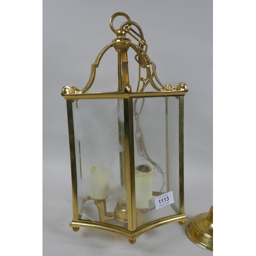 1113 - A brass ceiling lantern with concave glass panels, lantern 42cm high