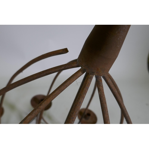 1117 - A wrought iron 9 branch candle chandelier, 75cm drop