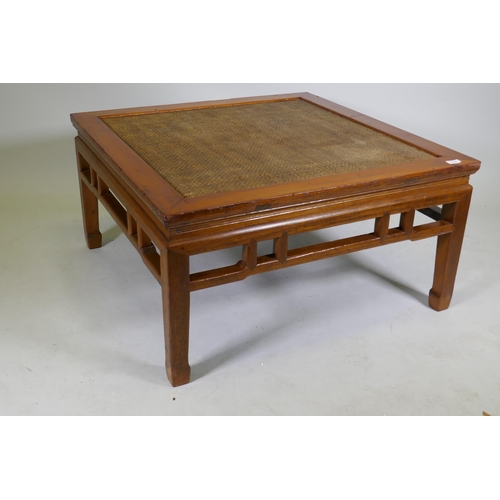 1120 - A Chinese low table with inset rattan top, 97 x 97cm, 50cm high