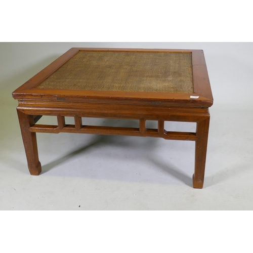 1120 - A Chinese low table with inset rattan top, 97 x 97cm, 50cm high