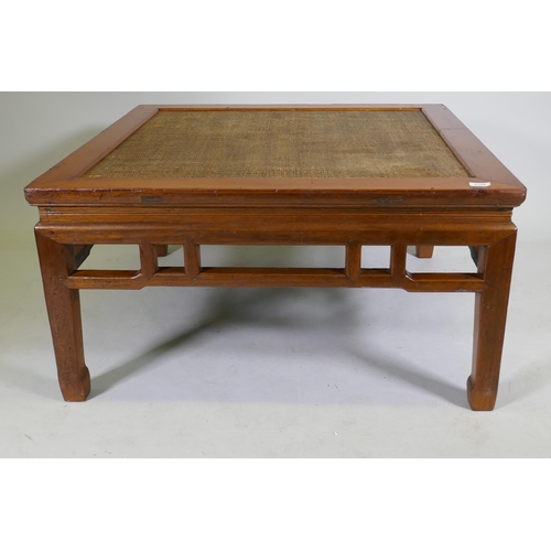 1120 - A Chinese low table with inset rattan top, 97 x 97cm, 50cm high