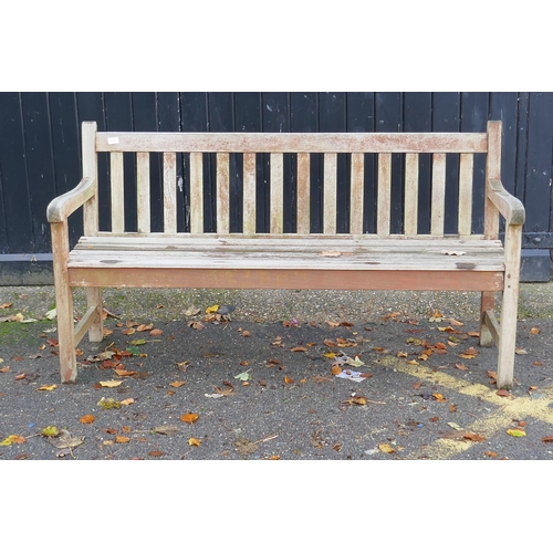 1128 - A teak garden bench, 153cm wide