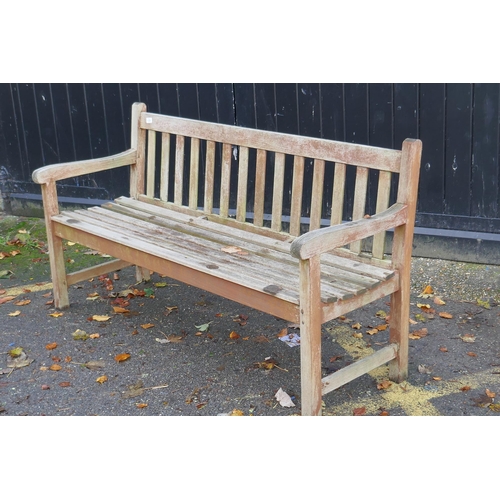 1128 - A teak garden bench, 153cm wide