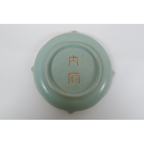 113 - A Chinese Ru ware style porcelain dish with lobed rim and chased character inscription, 2 character ... 