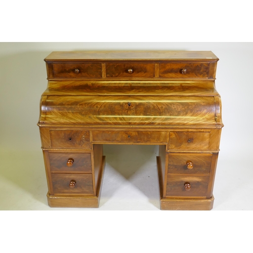 1130 - A C19th continental mahogany pedestal desk, the upper section with three drawers over a pull down fr... 