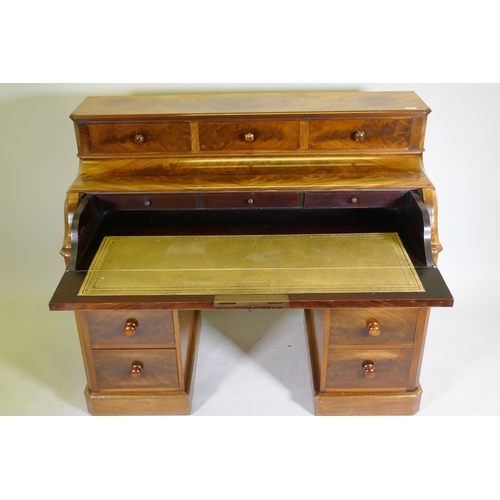 1130 - A C19th continental mahogany pedestal desk, the upper section with three drawers over a pull down fr... 