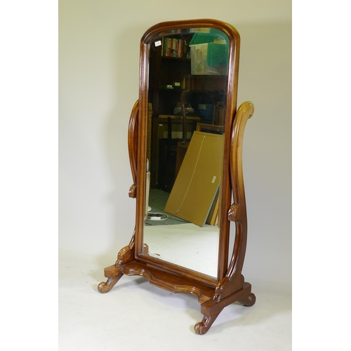 1134 - A Victorian style mahogany cheval mirror, with bevelled glass, 153cm high, 78cm wide