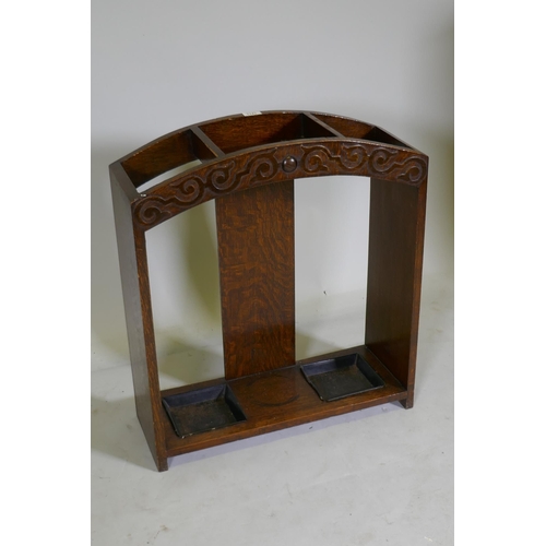 1141 - An Art Deco oak stick stand with carved decoration, 68 x 23 x 62cm