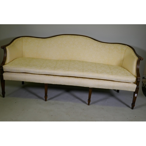 1144 - A Hepplewhite style humpback settee with scroll arms, raised on tapering supports, 200cm wide