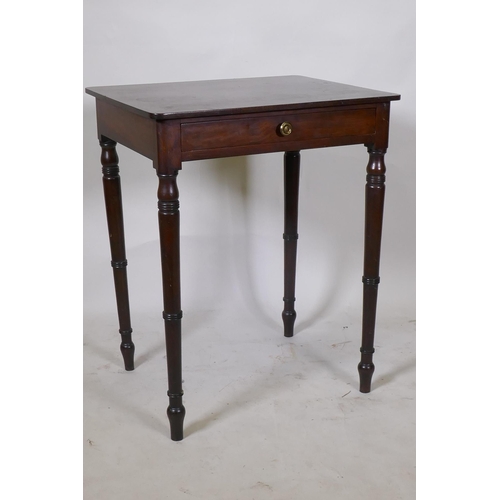 1157 - A Georgian mahogany single drawer side table, raised on ring turned tapering supports