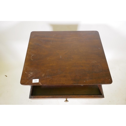 1157 - A Georgian mahogany single drawer side table, raised on ring turned tapering supports