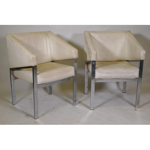 1171 - A pair of chrome metal framed arm chairs with vinyl covers