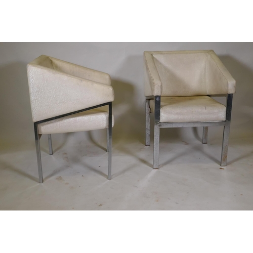 1171 - A pair of chrome metal framed arm chairs with vinyl covers